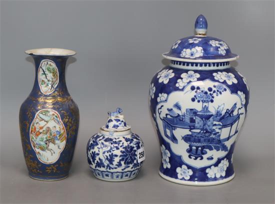 A Chinese gilt decorated powder blue vase, 19th century and two 19th century blue and white jars and covers